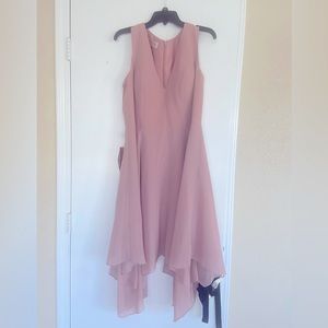 Both of these dresses are new and never worn. They have tags still on.
